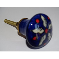 bouton en forme de poire outremer et fleur blanche