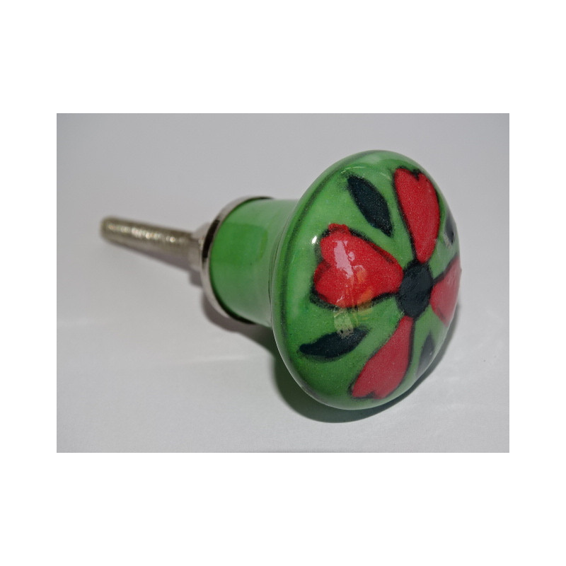 pulsante a forma di pera verde e fiore rosso