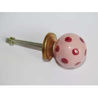 Pulsante rosa chiaro con passo palla rosa scuro