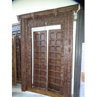 Old doors decorated with a carved lintel 142x18x224 cm