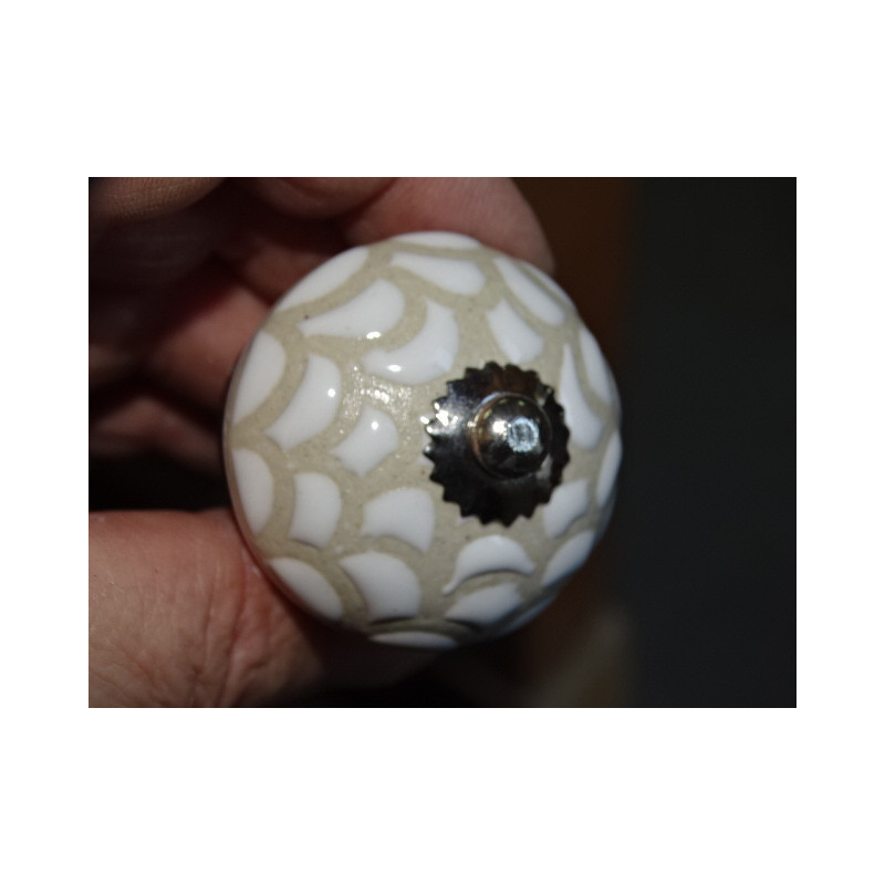 Furniture knobs with large embossed scales -...