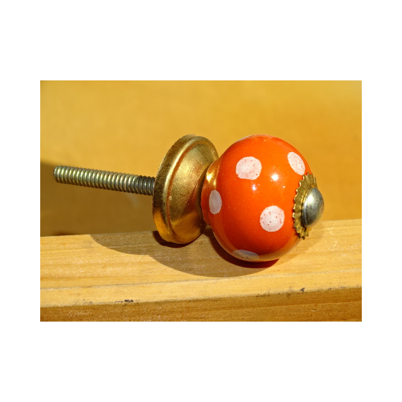 Small orange handles with white dots