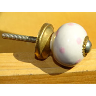 I piccoli puntini bianchi maniglie rosa