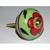 Spring green drawer or door knobs and red flower