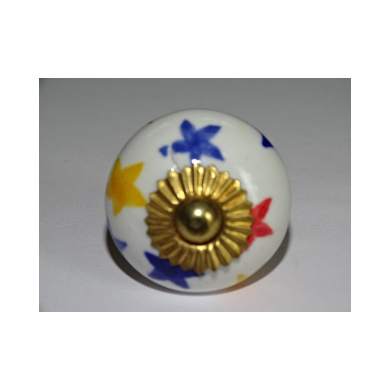 Boutons de tiroirs ou porte blanche et étoiles...