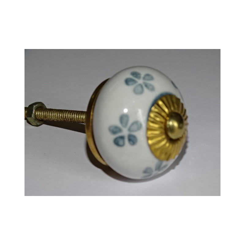 White drawer or door knobs and gray flowers