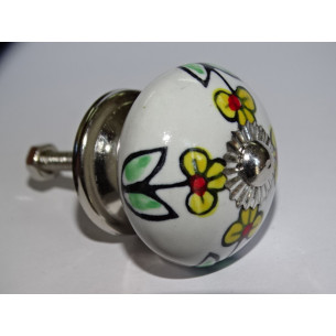 Furniture knobs in white porcelain and small yellow...