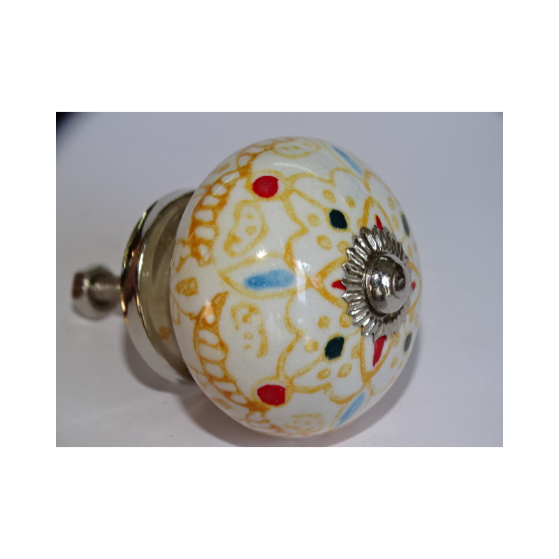 White furniture knobs with light orange...