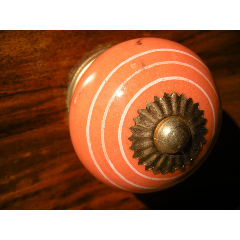 Porcelain knobs line white/orange