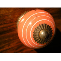 Porcelain knobs line white/orange