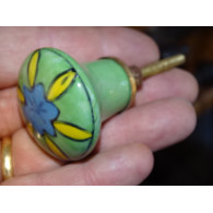 green porcelain button and yellow and turquoise flower